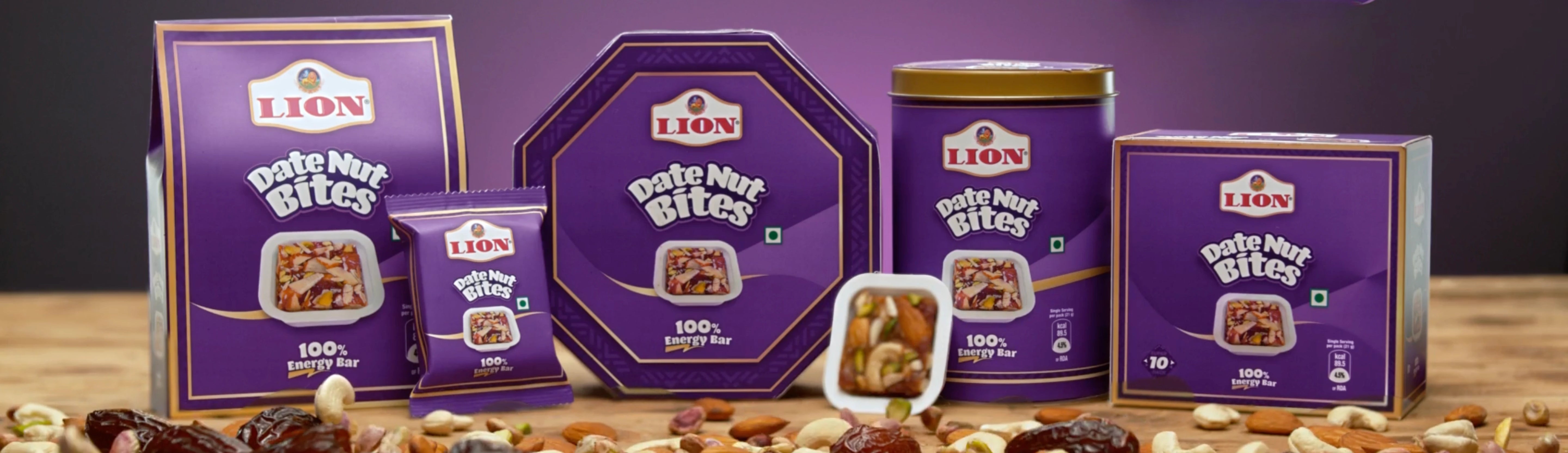Lion Dried Nut Bites packaging on a wooden surface with a dark background